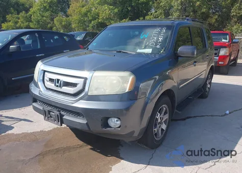 2010 Honda Pilot Touring z USA, uszkodzony, nr VIN 5FNYF4H91AB032731